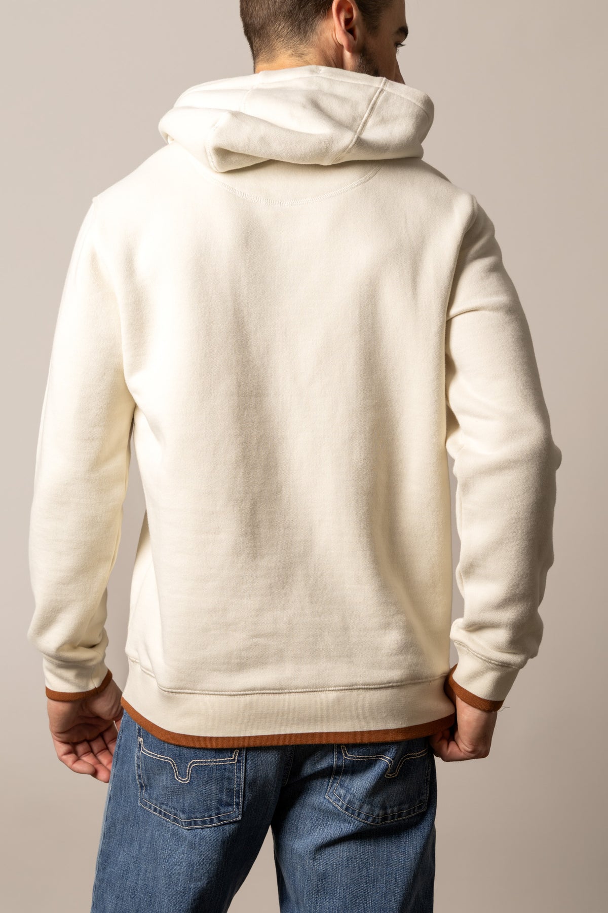 Kimes Ranch Berger hoodie in Natural, back view, with a hood and brown ribbed cuffs and hem