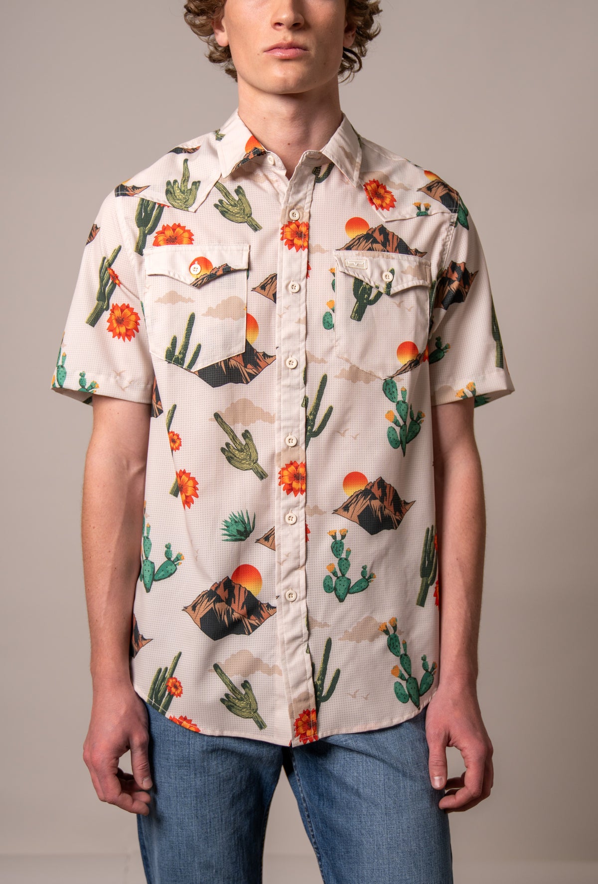Kimes Ranch Berry short sleeve dress shirt in Natural with a cactus and mountain print