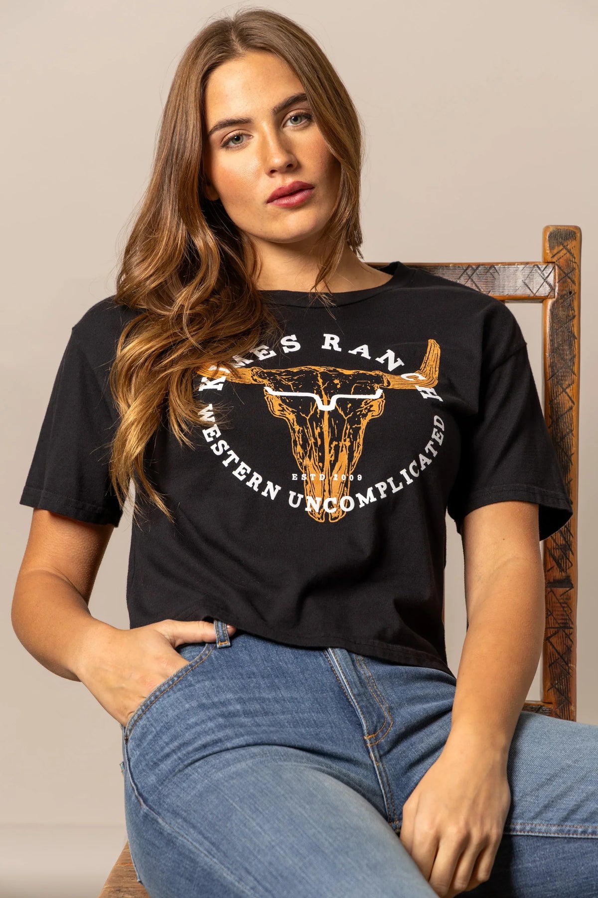 Kimes Ranch Bison Skull shirt in Black with a graphic of a bison skull and text reading Western Uncomplicated