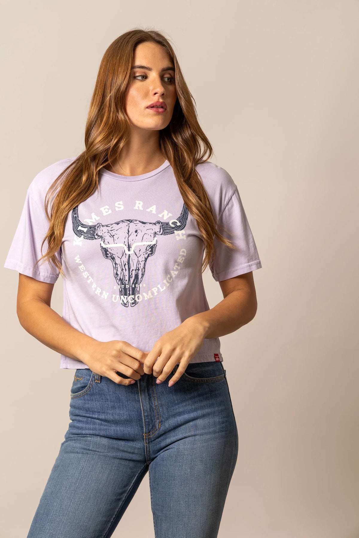 Kimes Ranch Bison Skull shirt in Lavender with a graphic of a steer skull and Western Uncomplicated text