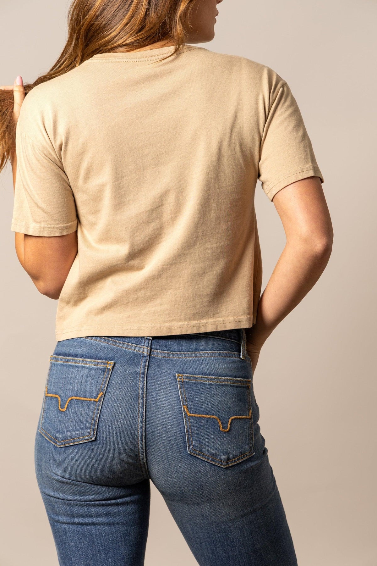 Kimes Ranch Bison Skull shirt in Tan, back view, with short sleeves and a crew neck