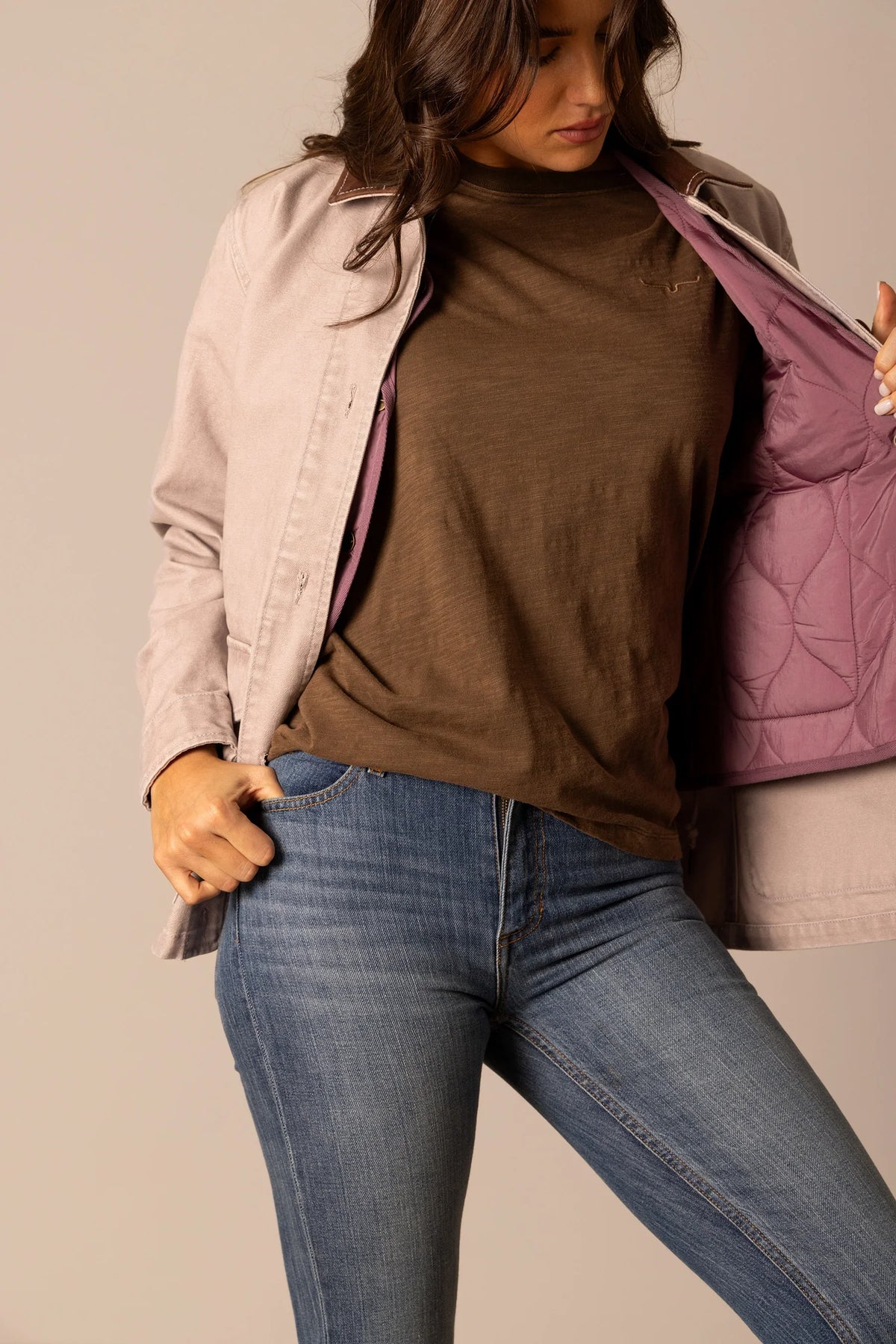 Kimes Ranch Blake Field Coat in Pewter, side view, a long sleeve jacket with a quilted mauve lining and a brown collar detail