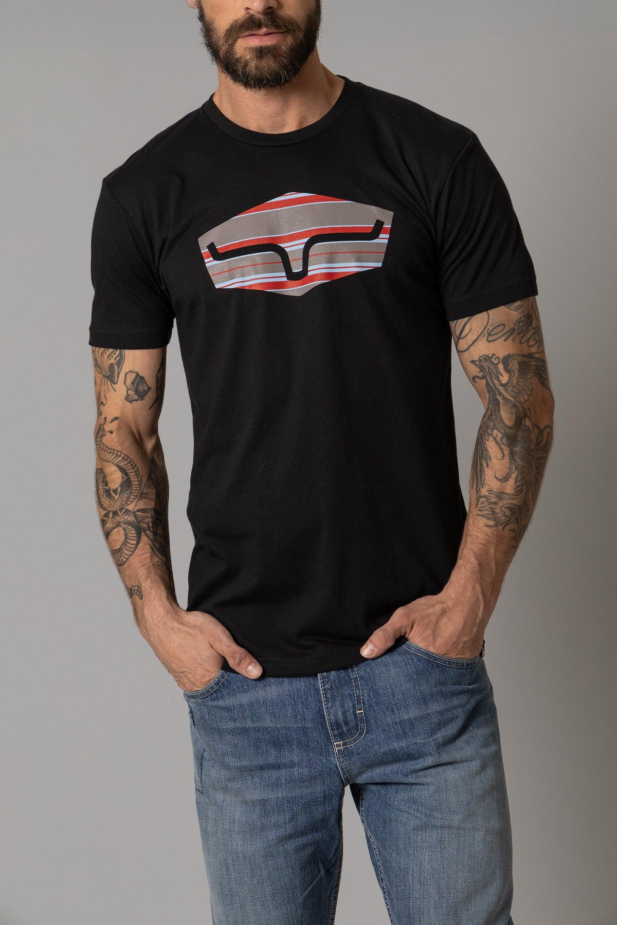 Kimes Ranch Box Seats Striped shirt in Black with a graphic of a stylized Kimes Ranch logo in red and grey stripes