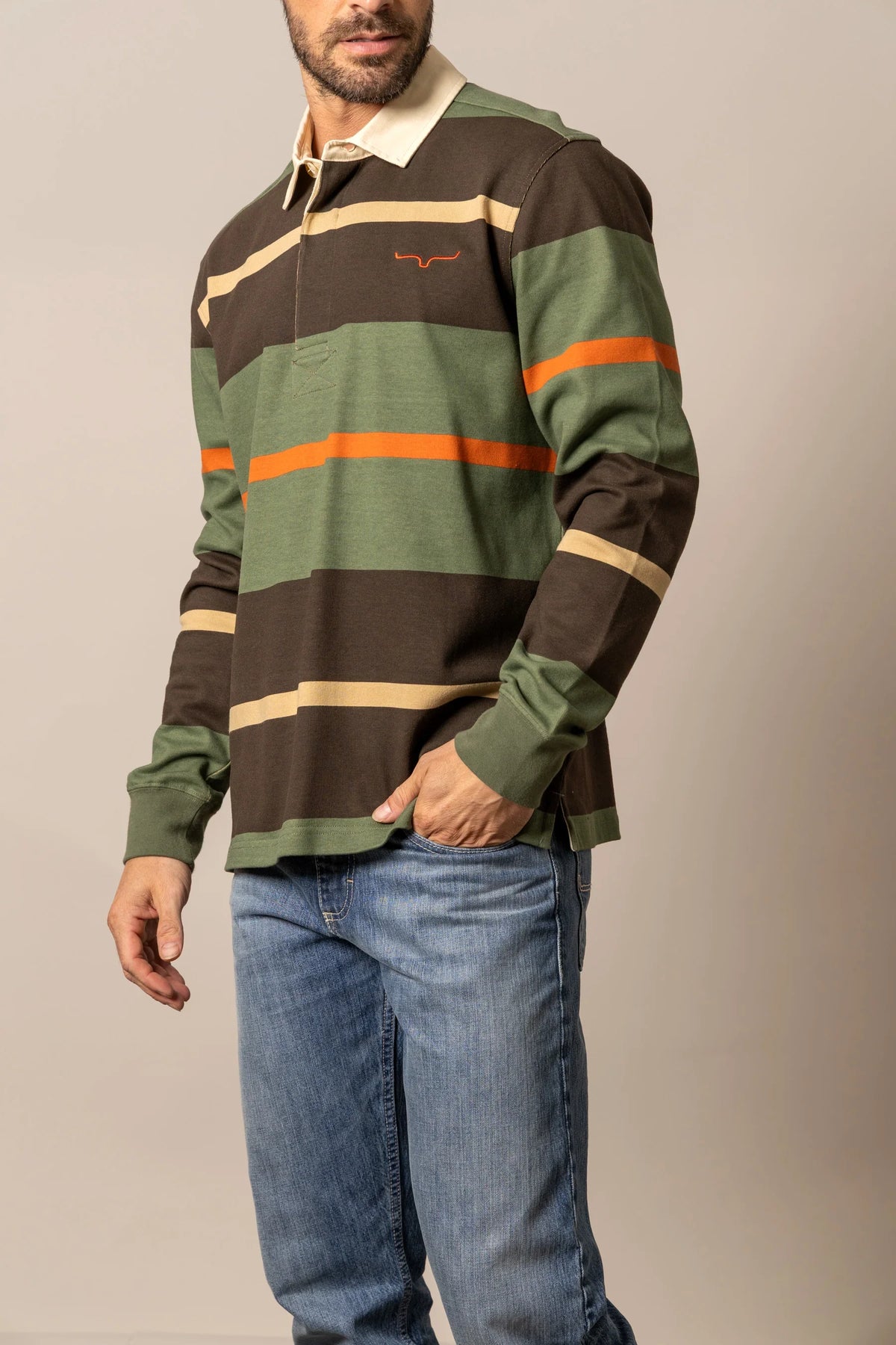Kimes Ranch Bulldog Rugby polo in Army Green, side view, with brown and tan horizontal stripes and an orange Kimes Ranch logo