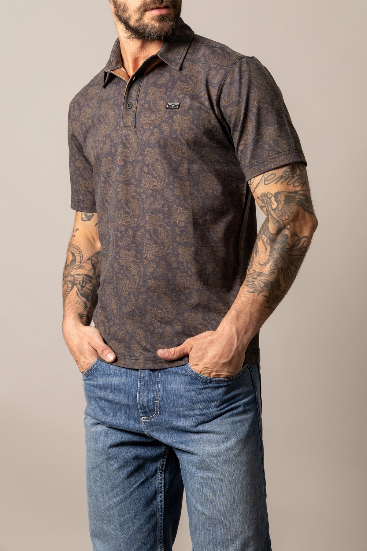 Kimes Ranch Burel polo in Black with an all-over paisley print and a small logo on the chest