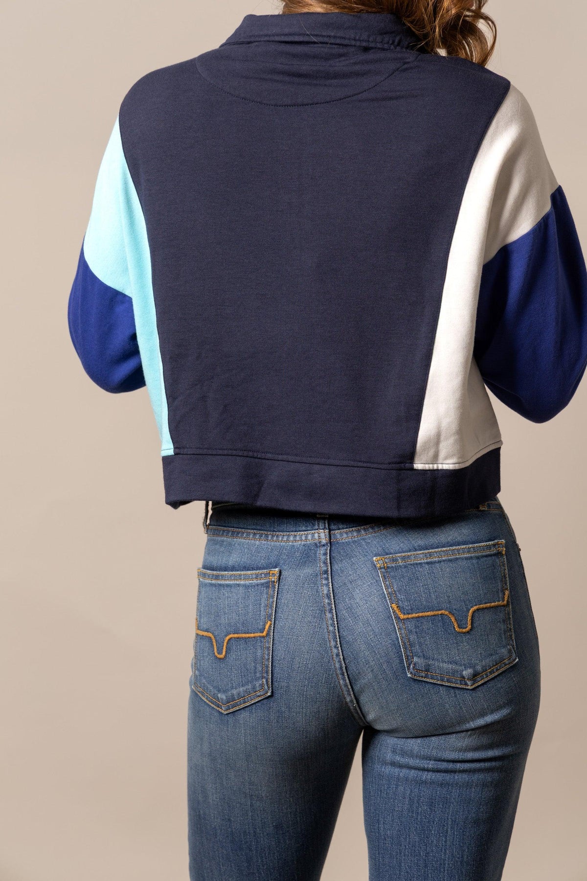 Kimes Ranch Cami Sweater in Navy, back view, with colorblocked sleeves in light blue and white