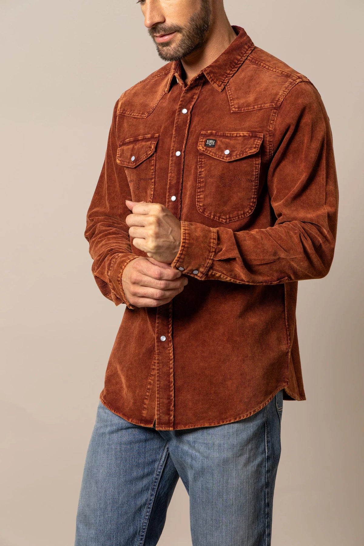 Kimes Ranch Catalina Cord dress shirt in Rust with snap pockets and a western yoke