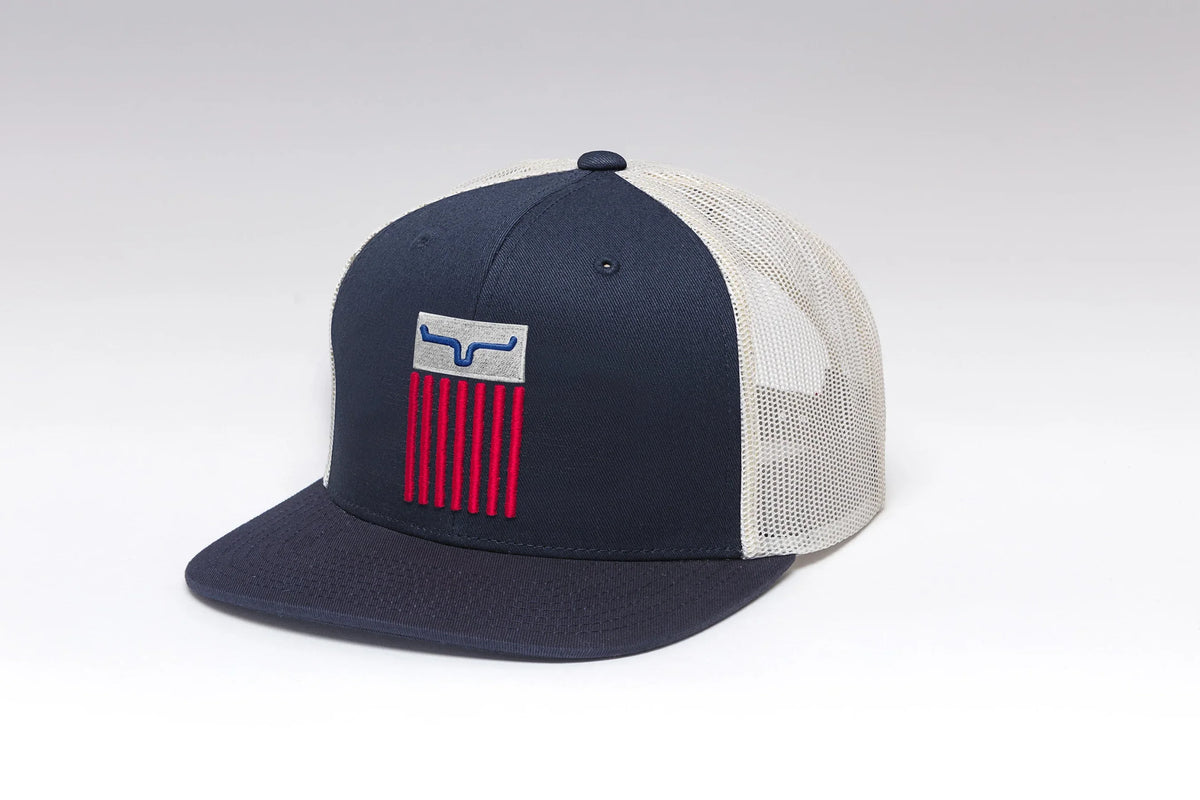 Kimes Ranch Cody Trucker hat in Navy, side view, with a mesh back and a red and blue logo on the front