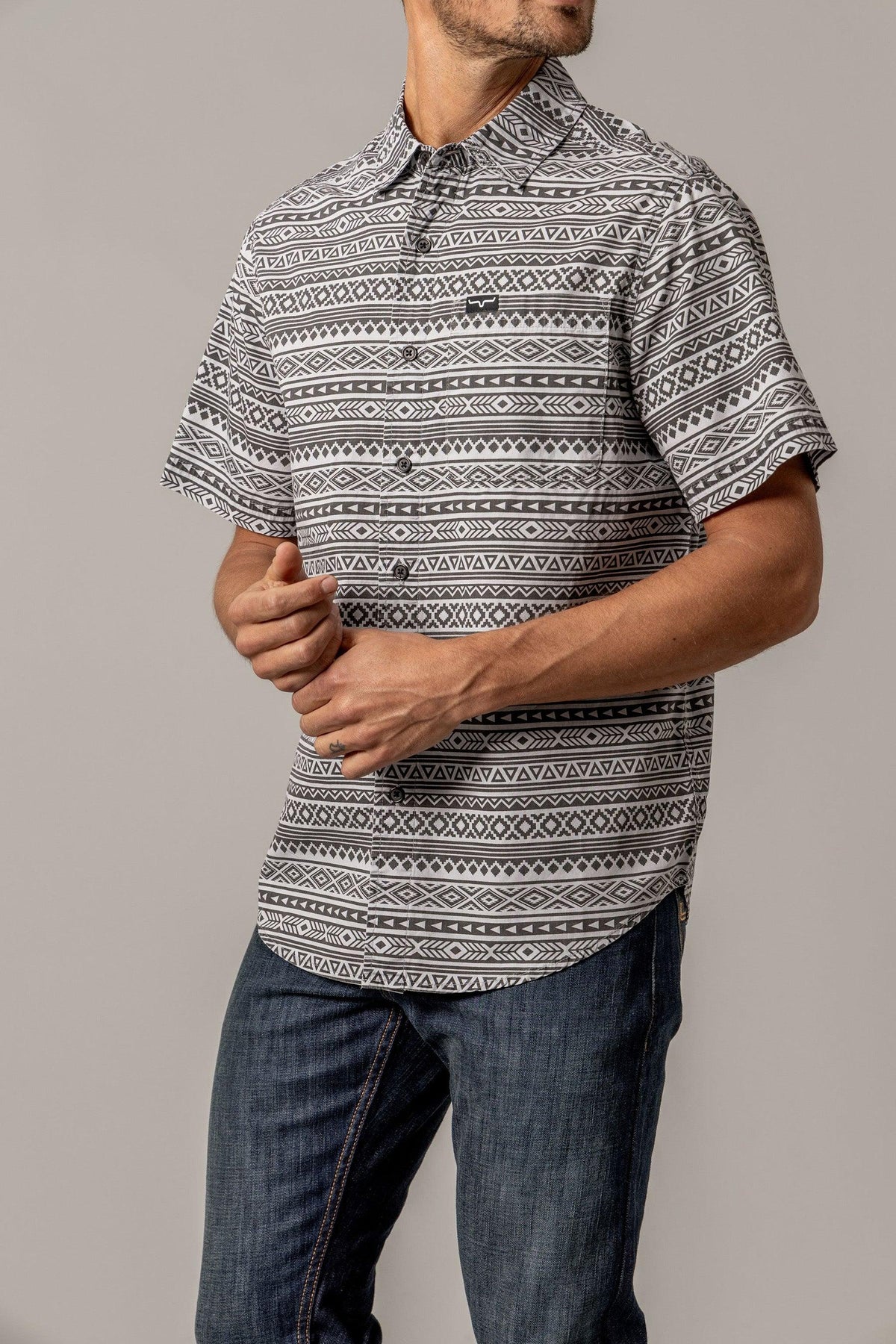 Kimes Ranch Colton Grey short sleeve dress shirt with a geometric pattern and chest pocket