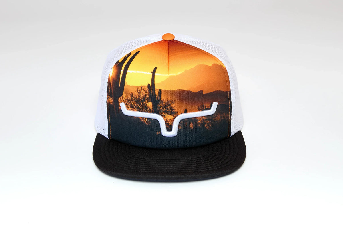Kimes Ranch Crestview hat with a sunset desert scene and white Kimes Ranch logo on the front panel