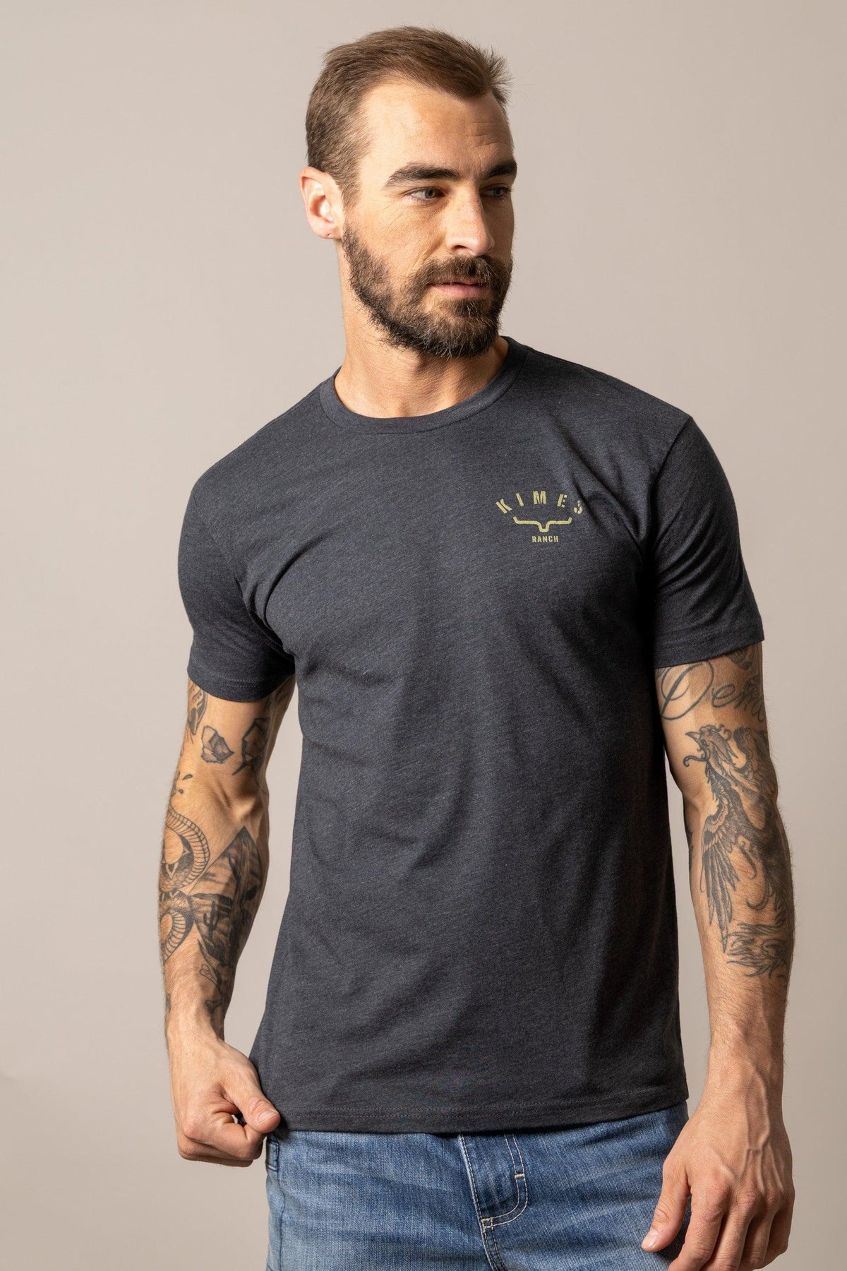 Kimes Ranch Cut Through Charcoal short sleeve shirt with a crew neck and the Kimes Ranch logo on the chest