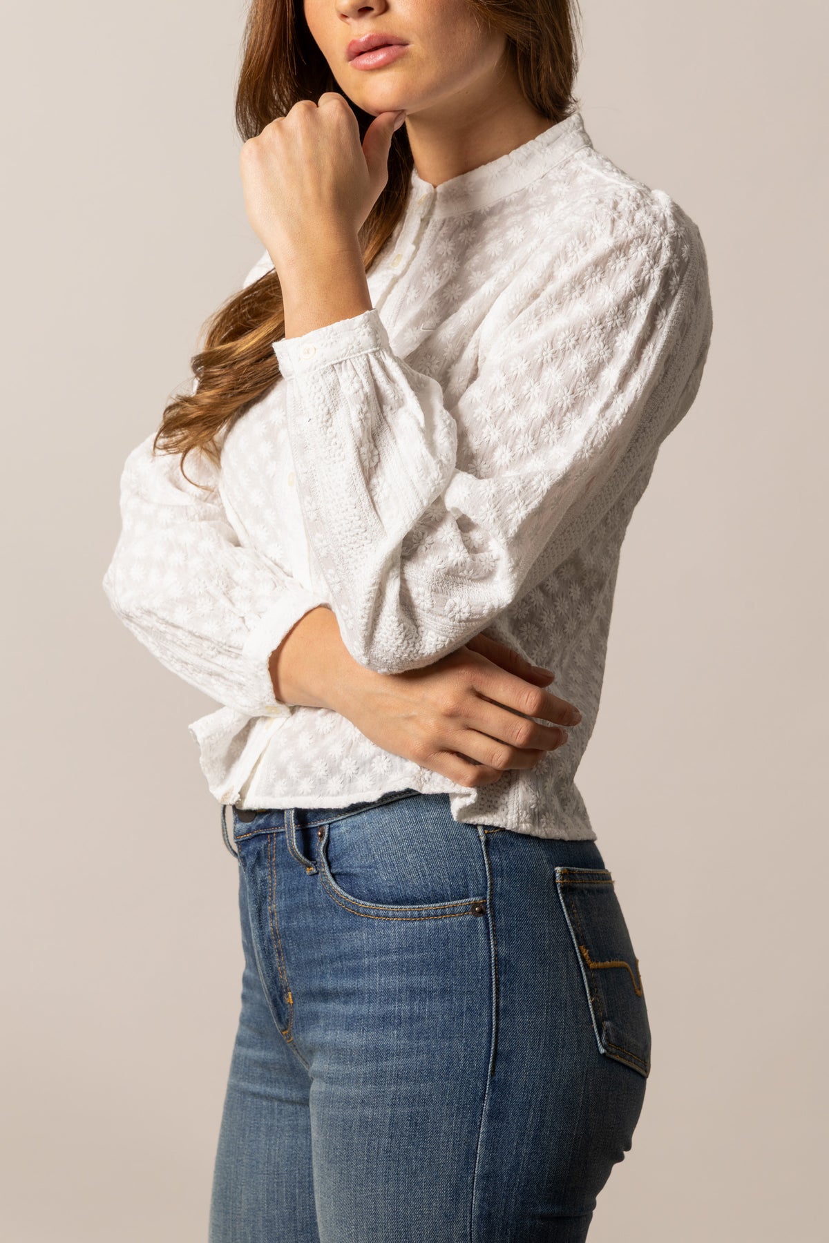 Kimes Ranch Daisychain top in Pristine, side view, with a textured floral pattern and long sleeves