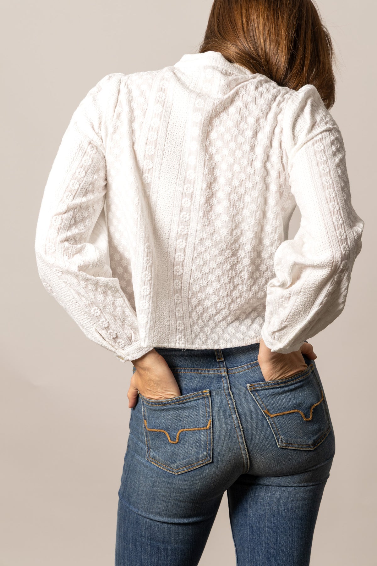 Kimes Ranch Daisychain top in Pristine, back view, with a textured floral pattern and long sleeves
