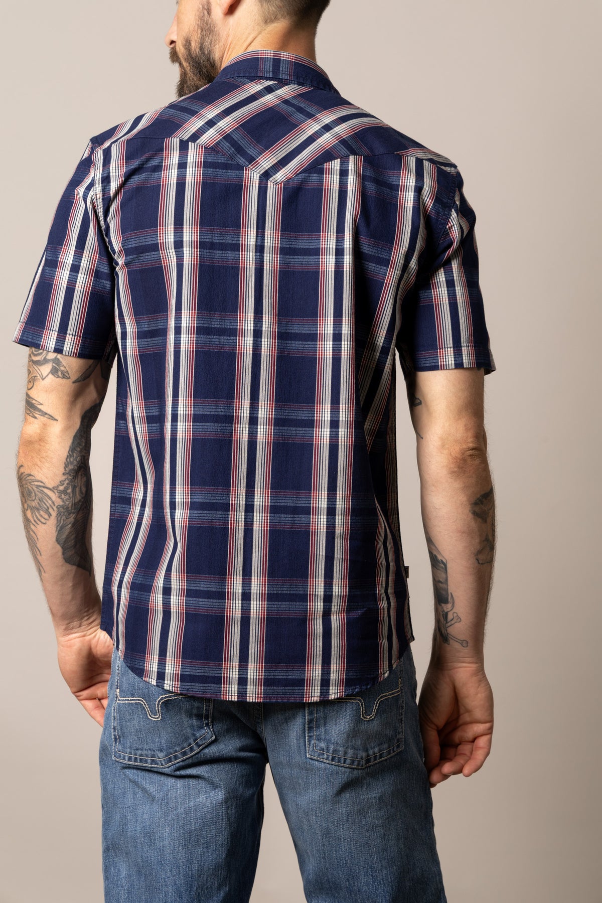 Kimes Ranch Davis dress shirt in Indigo, back view, with a plaid pattern and short sleeves