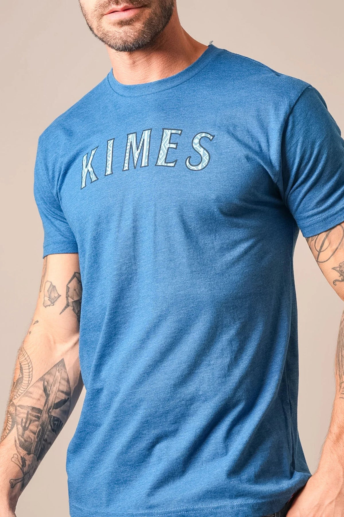 Kimes Ranch Delano shirt in Marine Blue with a Kimes Ranch logo graphic on the chest