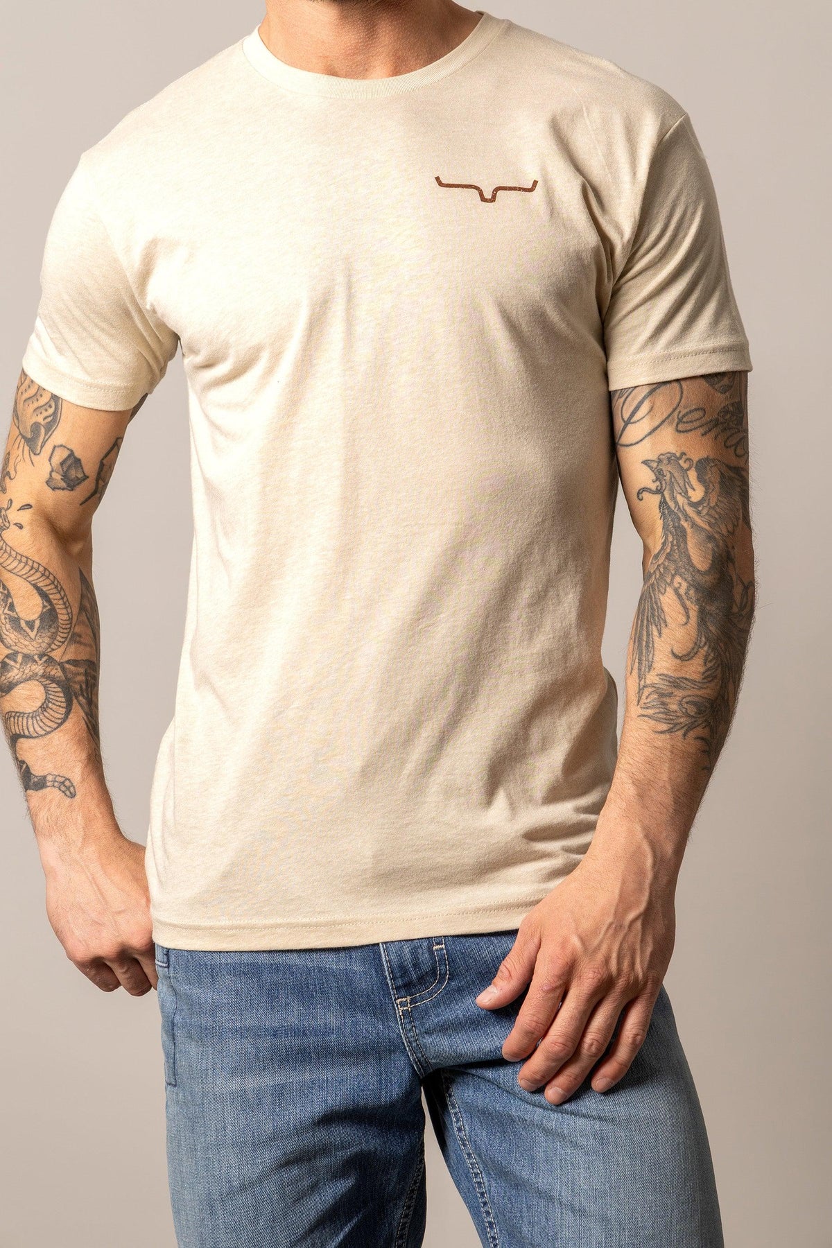 Kimes Ranch Desert Diamond Cream short sleeve shirt with embroidered logo on the chest