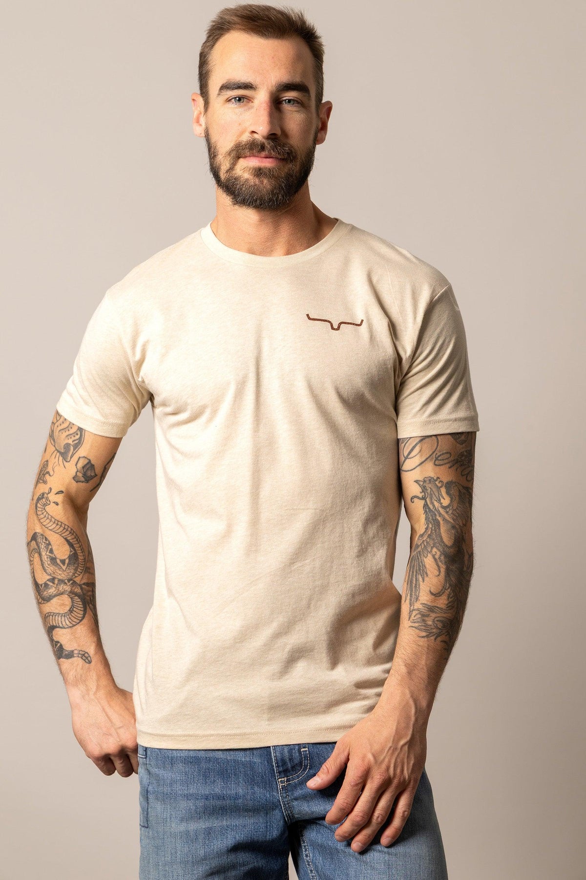 Kimes Ranch Desert Diamond Cream short sleeve shirt with a crew neck and embroidered Kimes Ranch logo on the chest