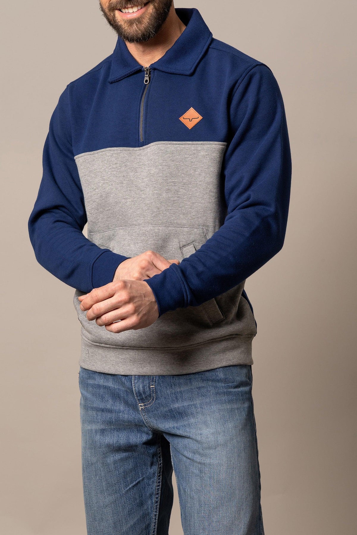 Kimes Ranch Diamond Head QZ Sweatshirt in Navy And Grey with a front kangaroo pocket and logo patch