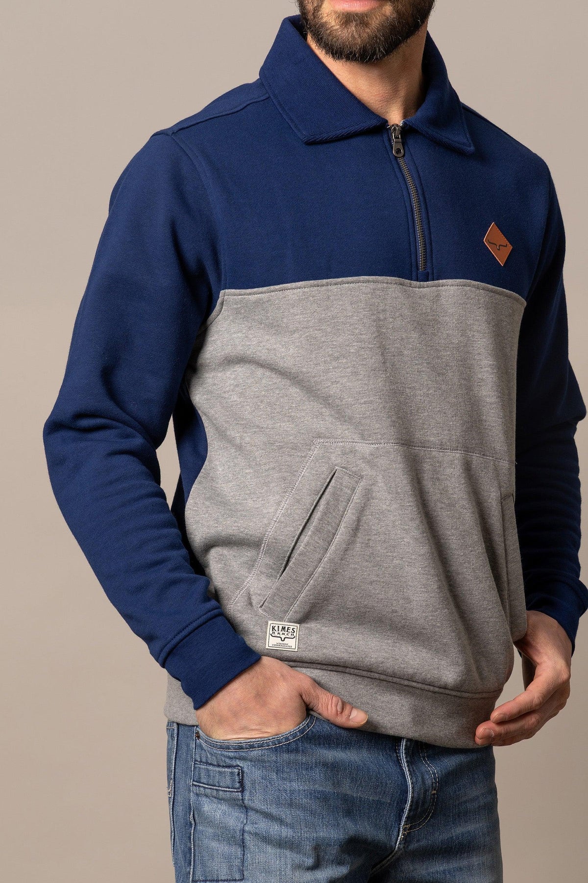 Kimes Ranch Diamond Head QZ Sweatshirt in Navy And Grey with a half-zip collar and front kangaroo pocket