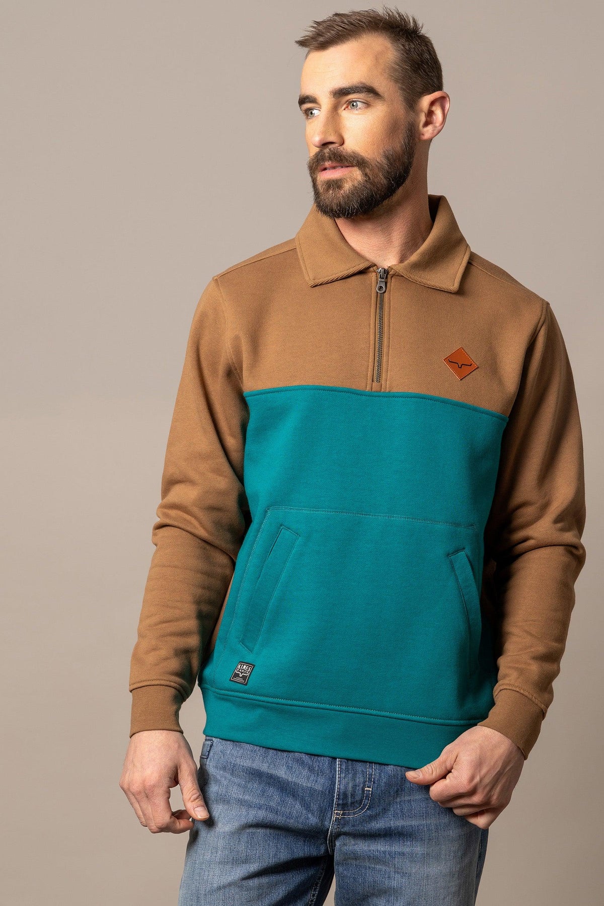 Kimes Ranch Diamond Head QZ Sweatshirt in Brown And Teal with a quarter zip collar and front kangaroo pocket