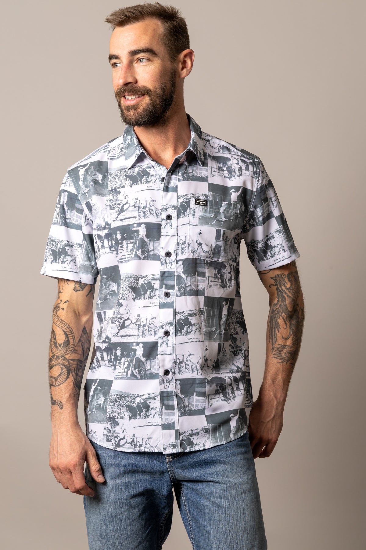 Kimes Ranch Dunn dress shirt in black and white with a collage print of rodeo scenes and a chest logo