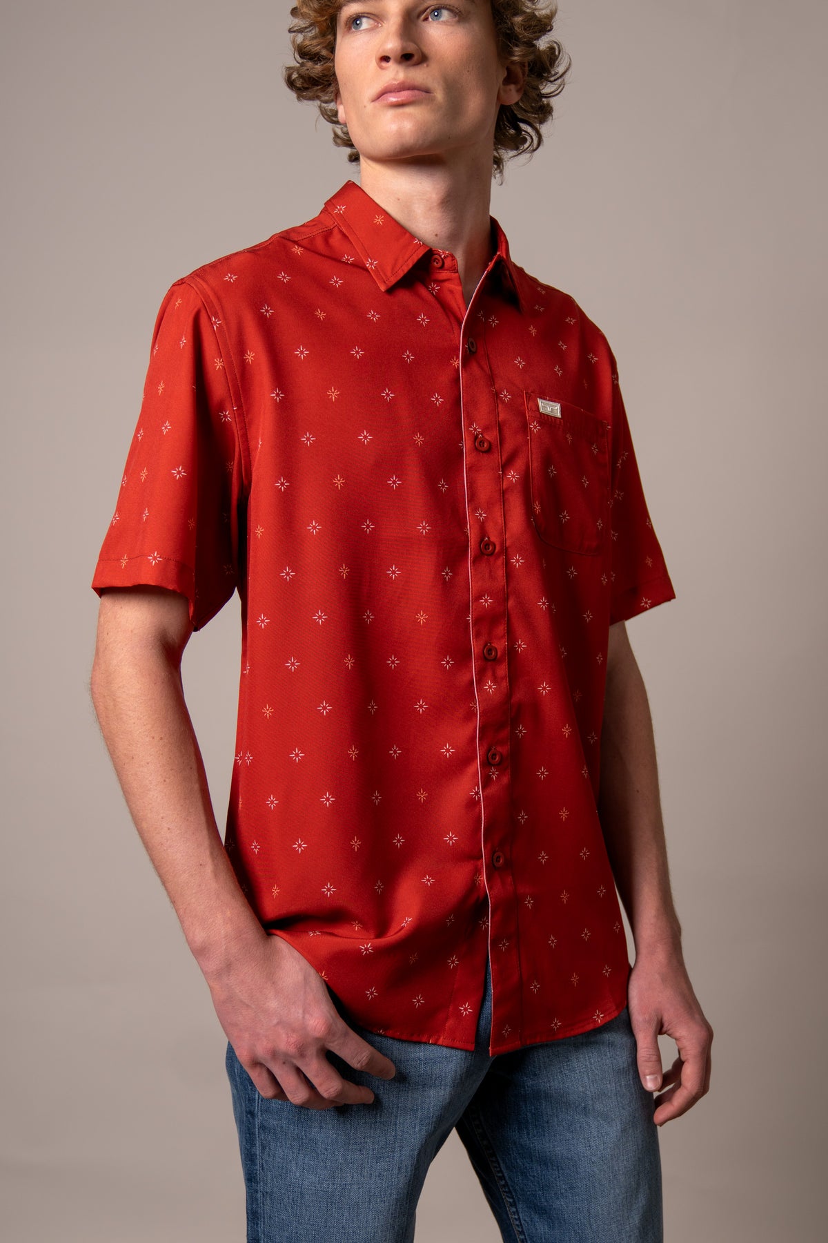 Kimes Ranch Dunn Red short sleeve dress shirt with small white star pattern and chest pocket