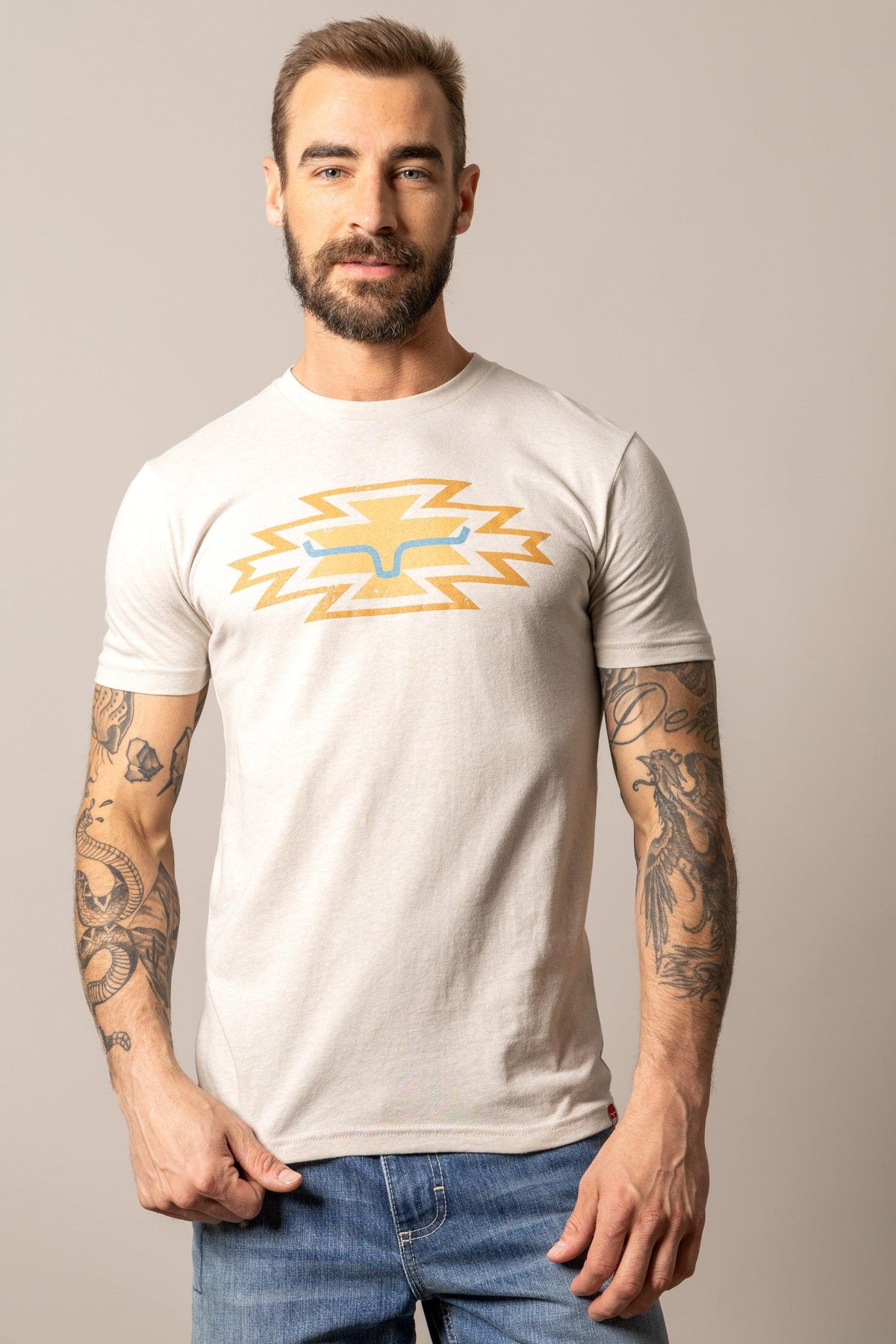 Kimes Ranch Durango shirt in Sand with a yellow and blue lightning bolt graphic on the chest