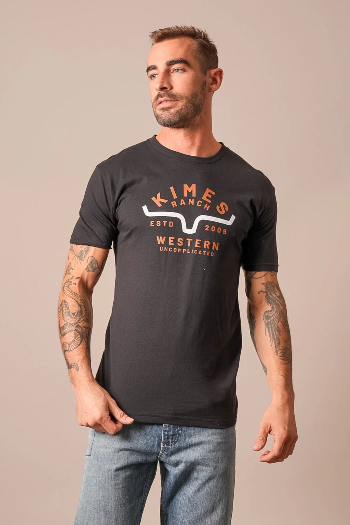 Kimes Ranch Easy Does It shirt in Black with a graphic featuring the Kimes Ranch logo and text reading Western Uncomplicated