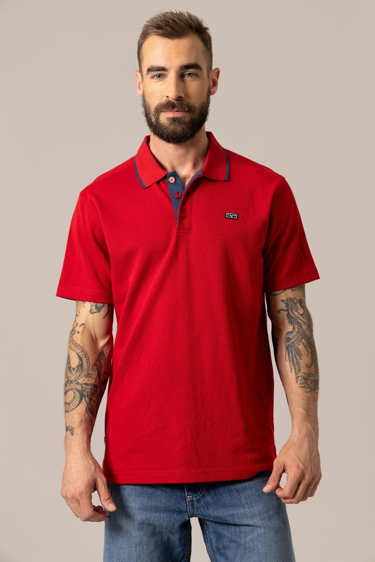 Kimes Ranch El Capitan Polo in Red with a navy collar and logo