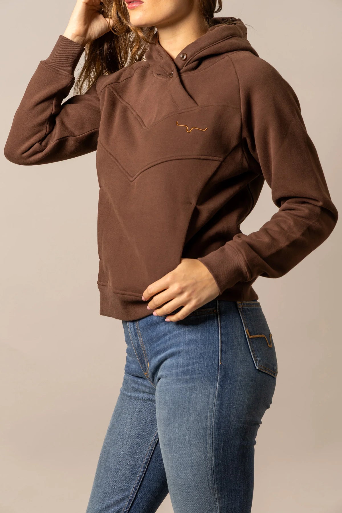 Kimes Ranch Ella hoodie in Brown, side view, with a front yoke seam and embroidered logo
