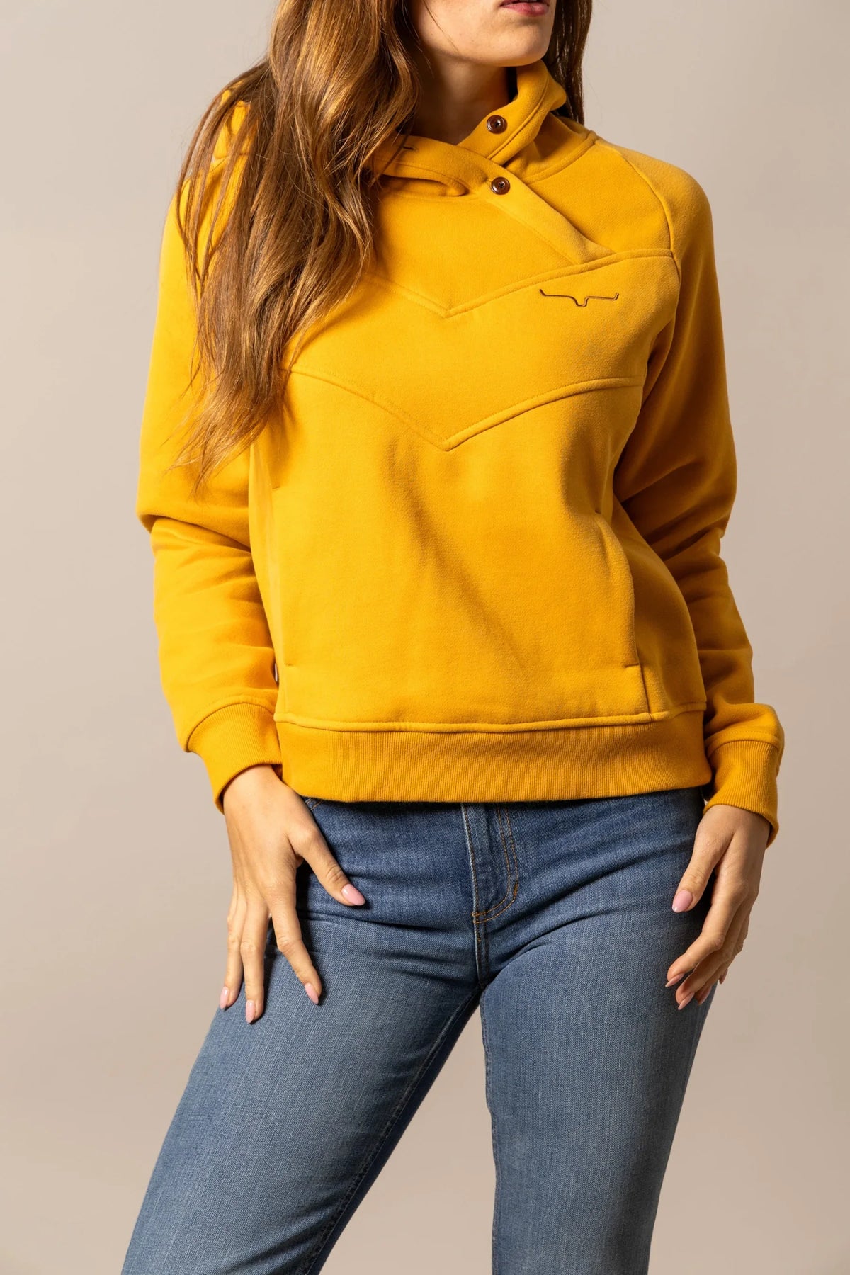 Kimes Ranch Ella hoodie in Yellow Ochre with a front yoke seam and embroidered logo