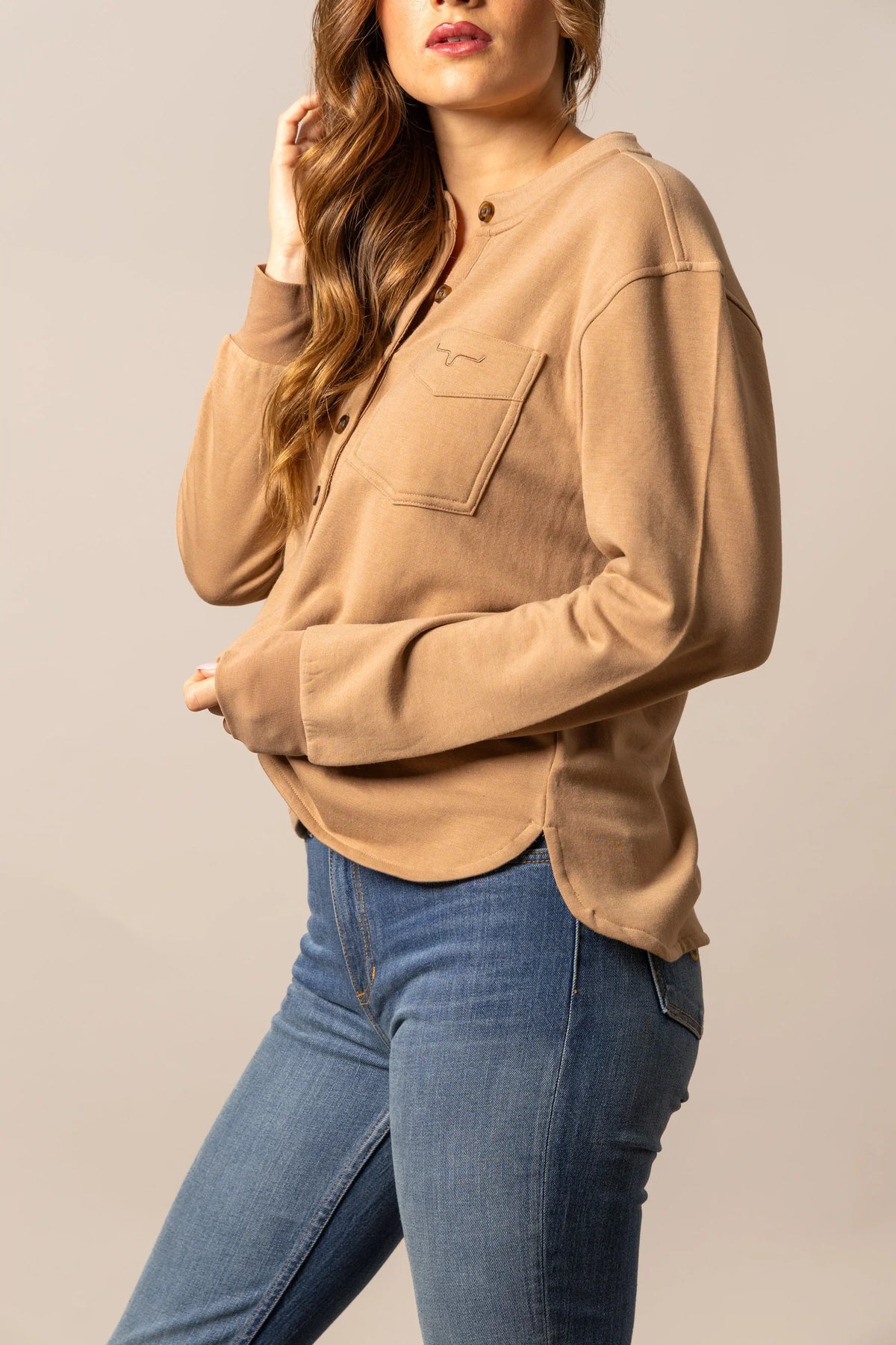 Kimes Ranch Elouise Henley sweater in Brown, side view, with a chest pocket and long sleeves