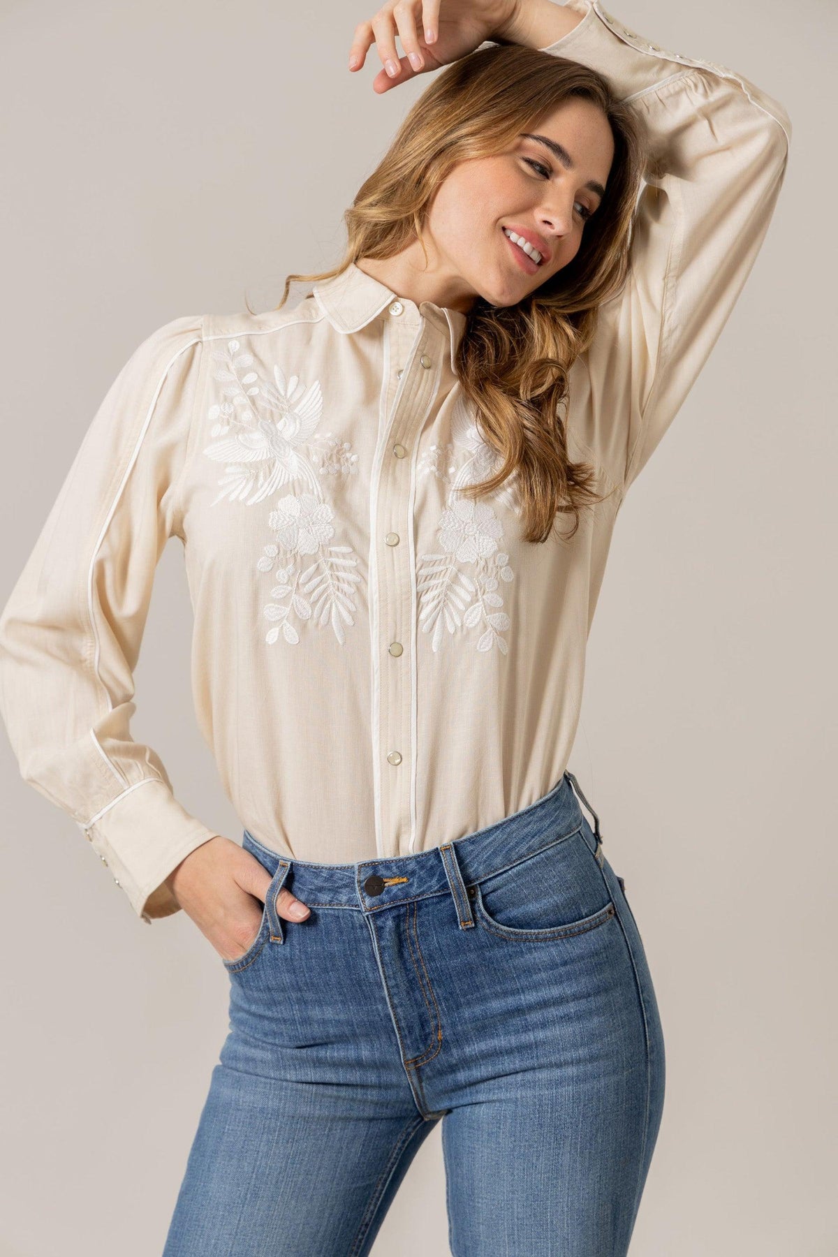 Kimes Ranch Emilia Tencel top in Natural with white floral embroidery and contrast stitching
