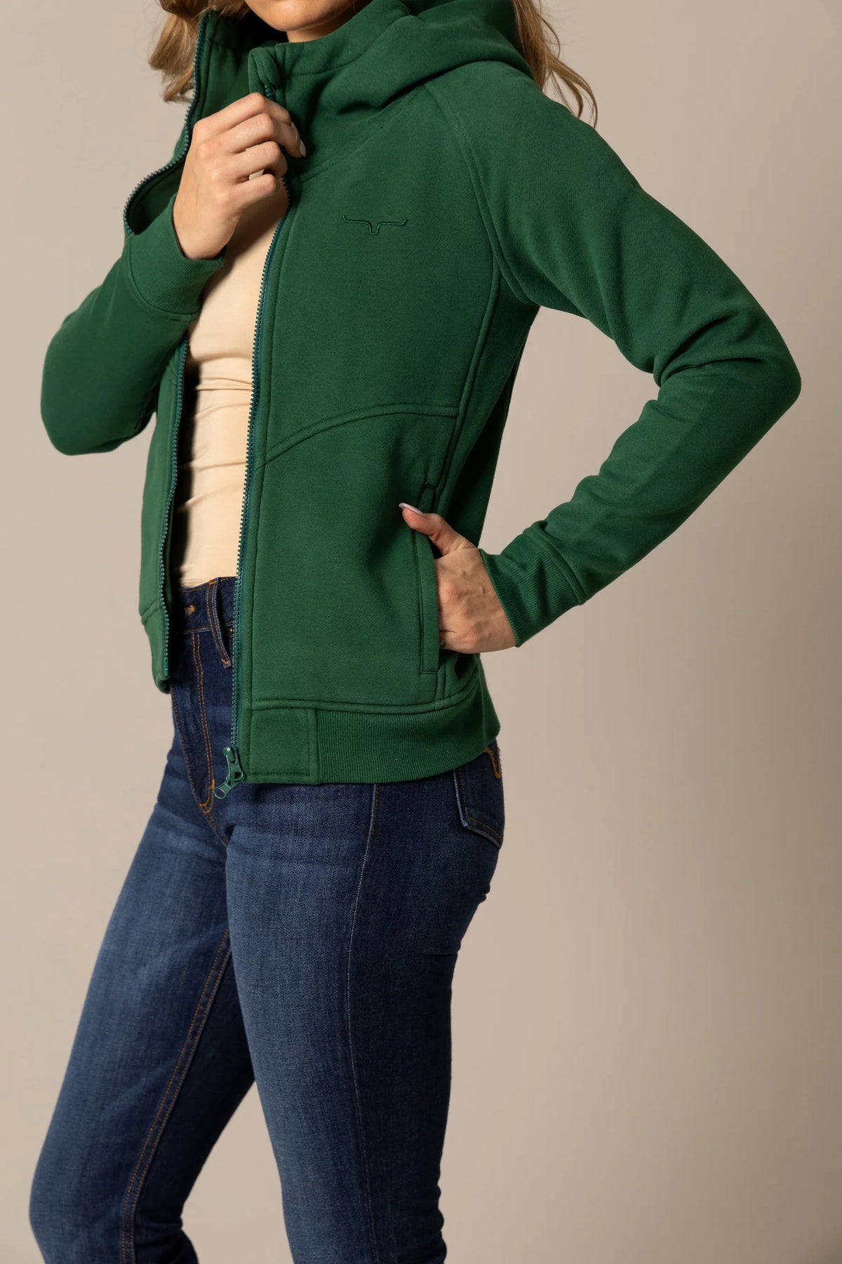 Kimes Ranch Emma Hoodie in Forest, side view, with a front zip, kangaroo pocket and embroidered logo