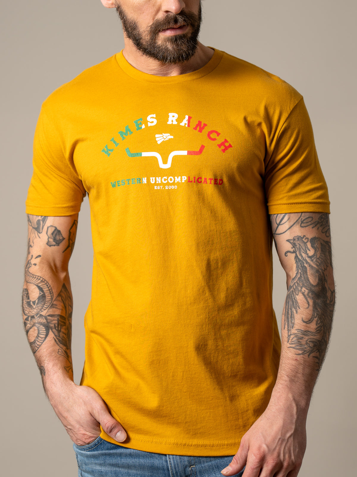 Kimes Ranch Establecido En 2009 shirt in Antique Gold with a vintage graphic print featuring the brand name and logo
