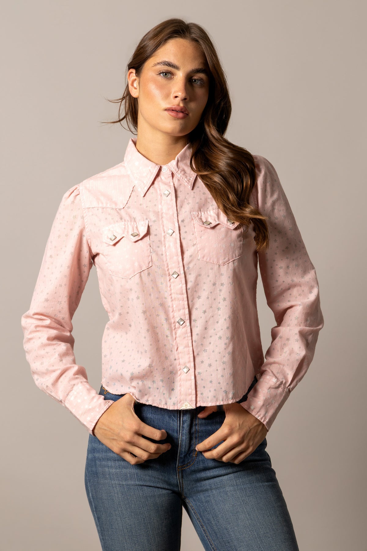 Kimes Ranch Etoile long sleeve western top in Light Pink with a star print and snap button front