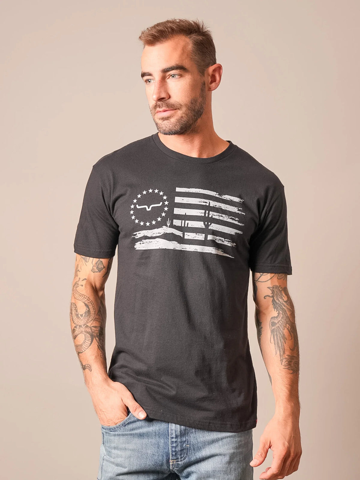 Kimes Ranch Faded shirt in Black with a distressed flag graphic featuring the Kimes Ranch logo and cactus