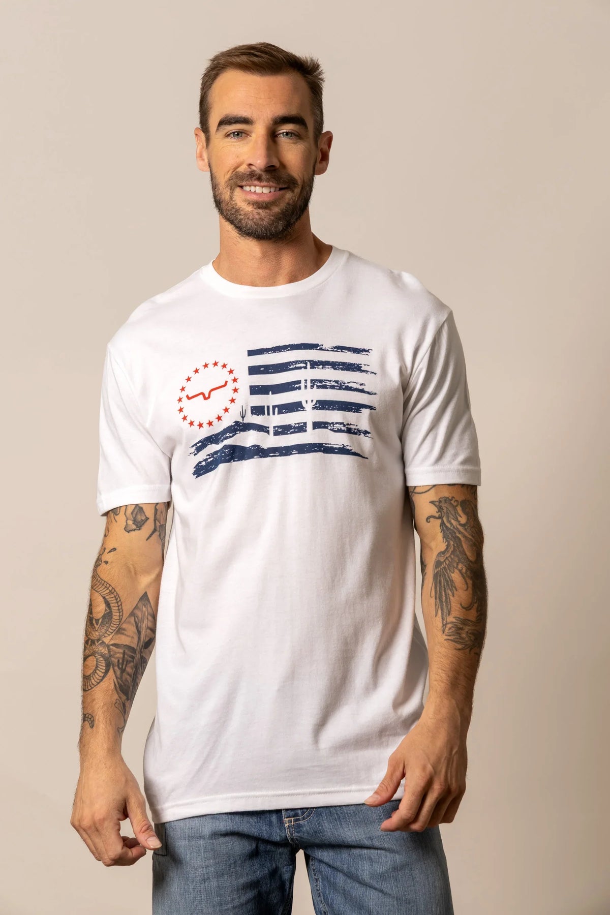 Kimes Ranch Faded White t-shirt with a distressed Arizona flag graphic featuring cacti and the Kimes Ranch logo