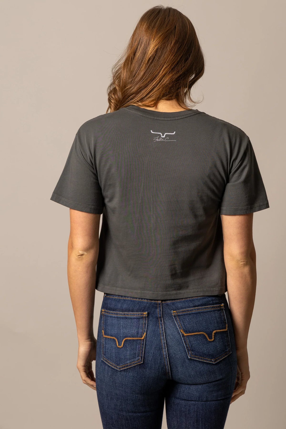 Kimes Ranch Fallon Madonna shirt in Pepper, back view, with short sleeves and a back yoke logo