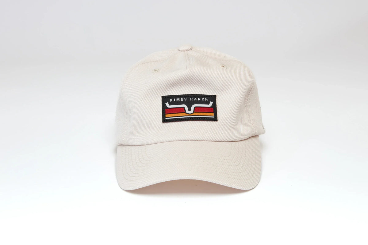 Kimes Ranch Felton hat in Natural with a rectangular logo patch featuring red and yellow stripes