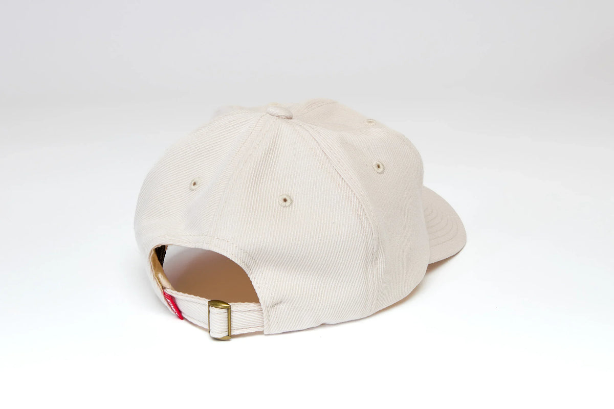 Kimes Ranch Felton hat in Natural, back view, with a buttoned back strap and eyelet vents