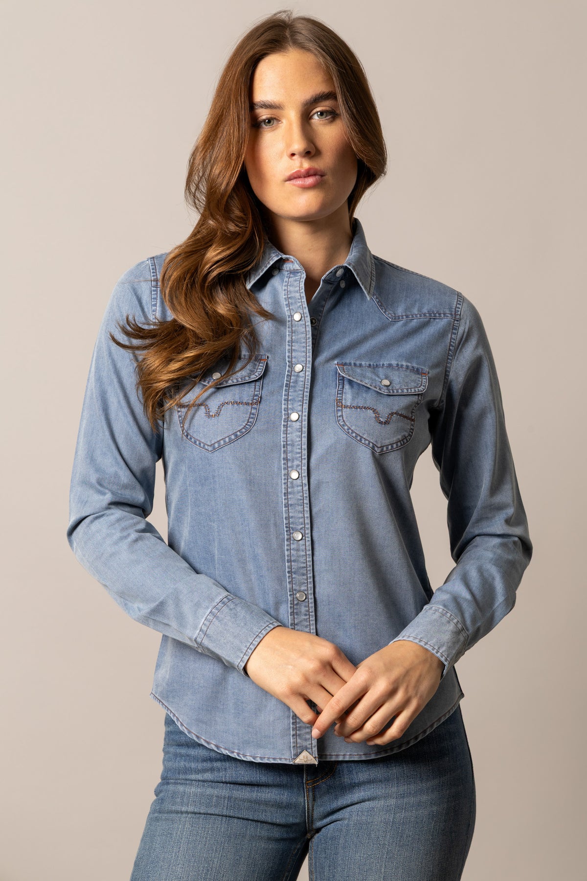 Kimes Ranch Flinn top in Indigo with a western yoke and contrast stitching on the chest pockets