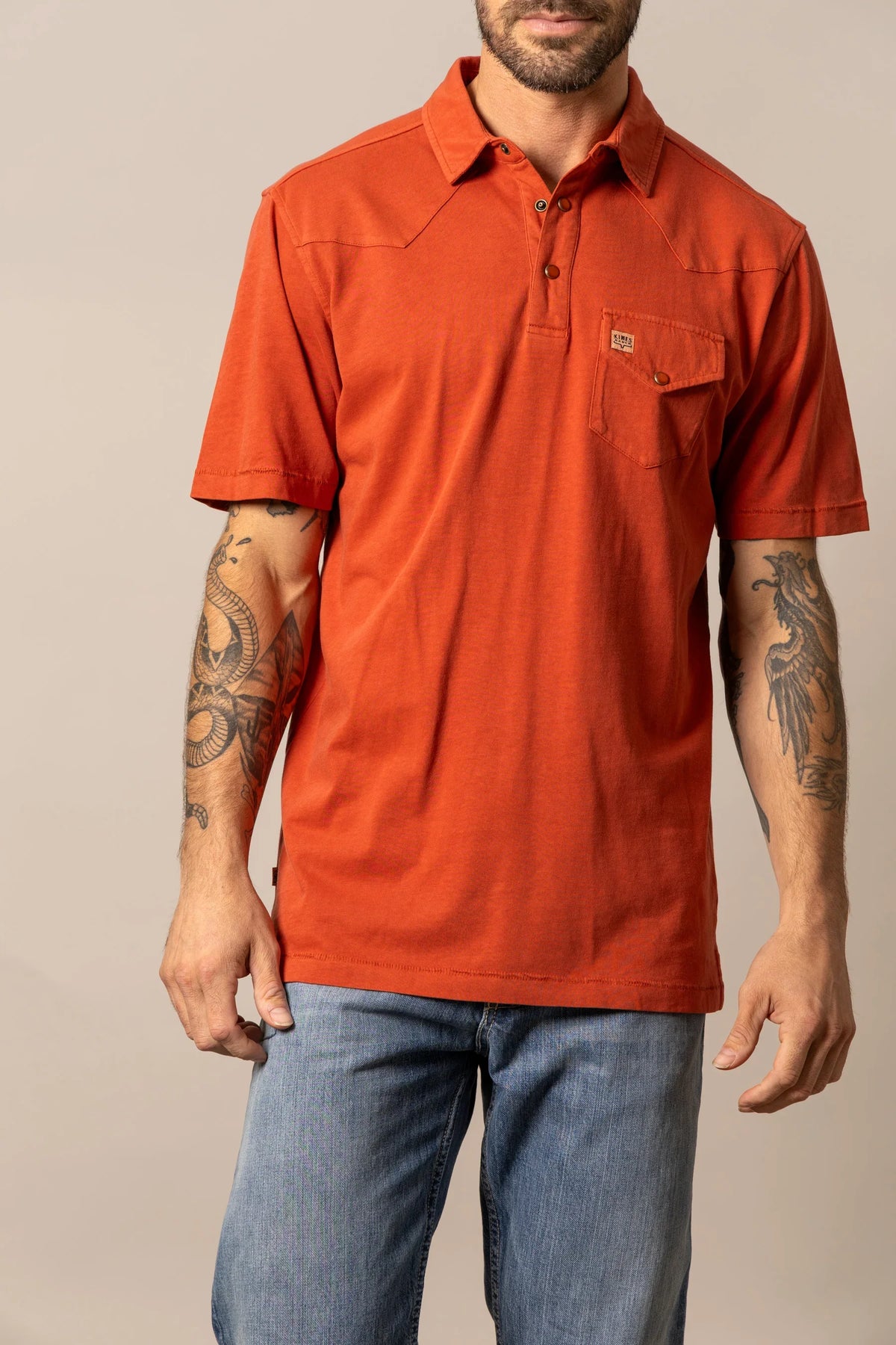 Kimes Ranch Fluger Polo in Brick Red with a western yoke and chest pocket