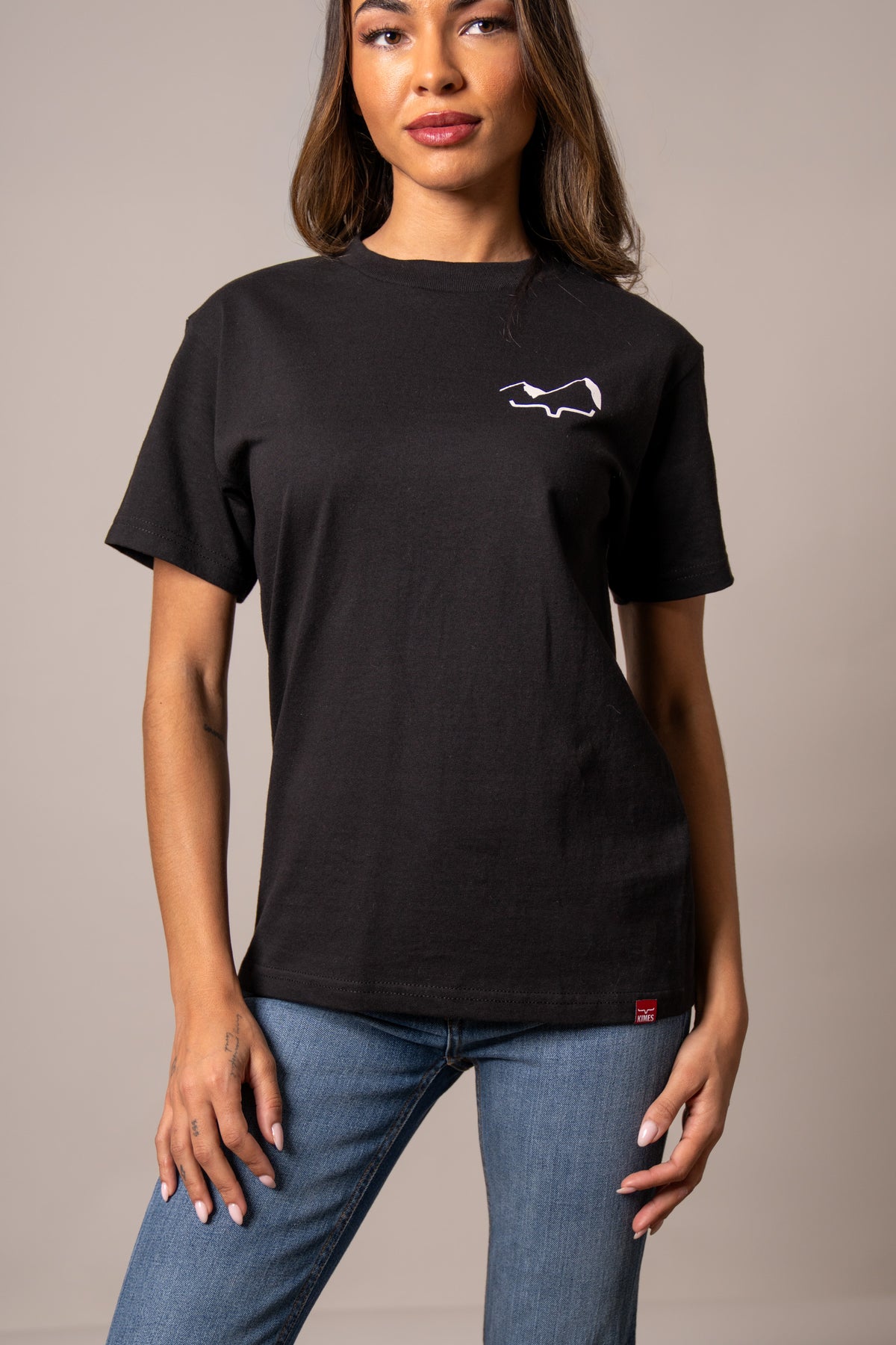 Kimes Ranch Flying High shirt in Black with a white logo on the chest and a red tag at the hem