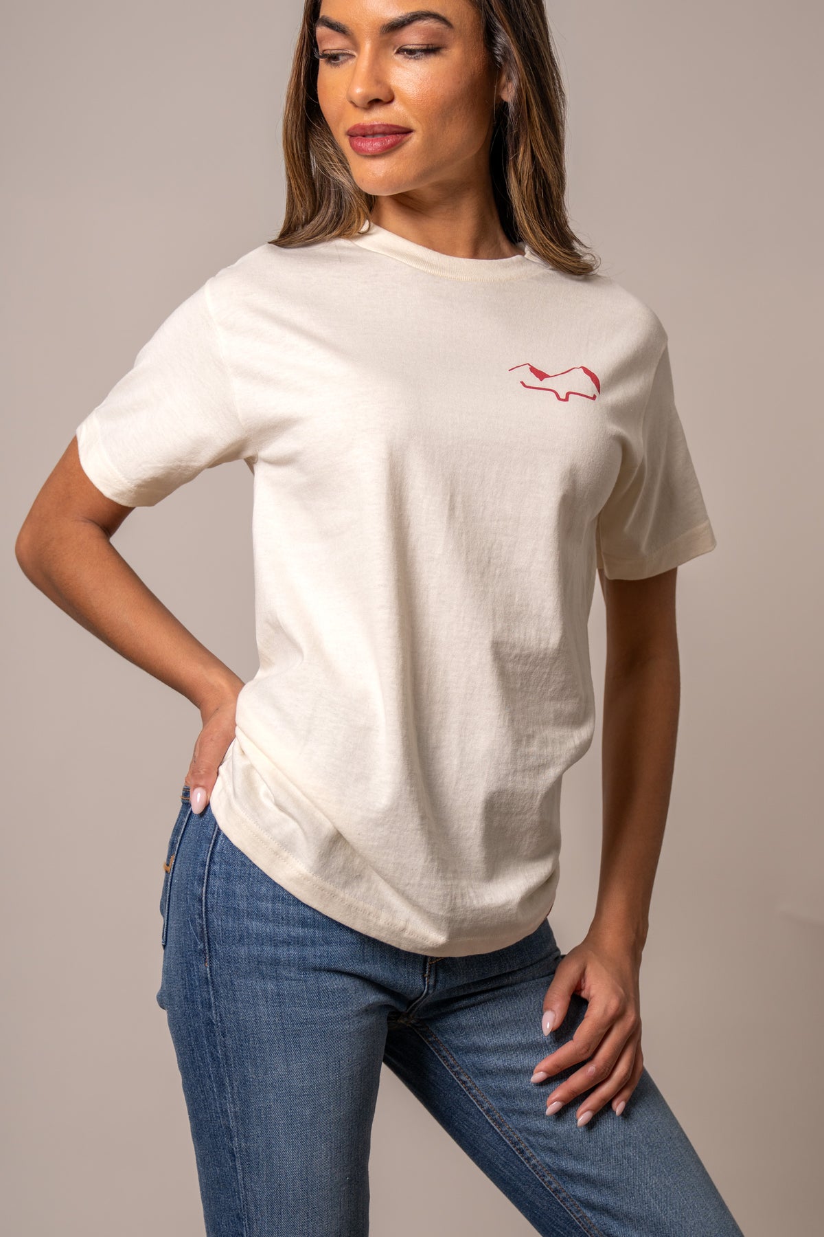 Kimes Ranch Flying High Cream short sleeve shirt with red Kimes Ranch logo on the chest