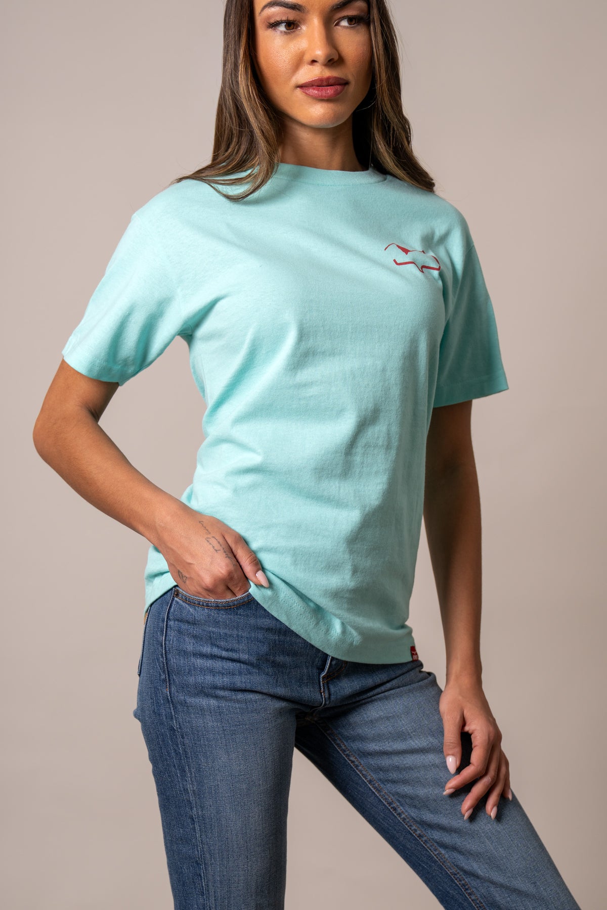 Kimes Ranch Flying High shirt in Light Blue with a red Kimes Ranch logo on the chest