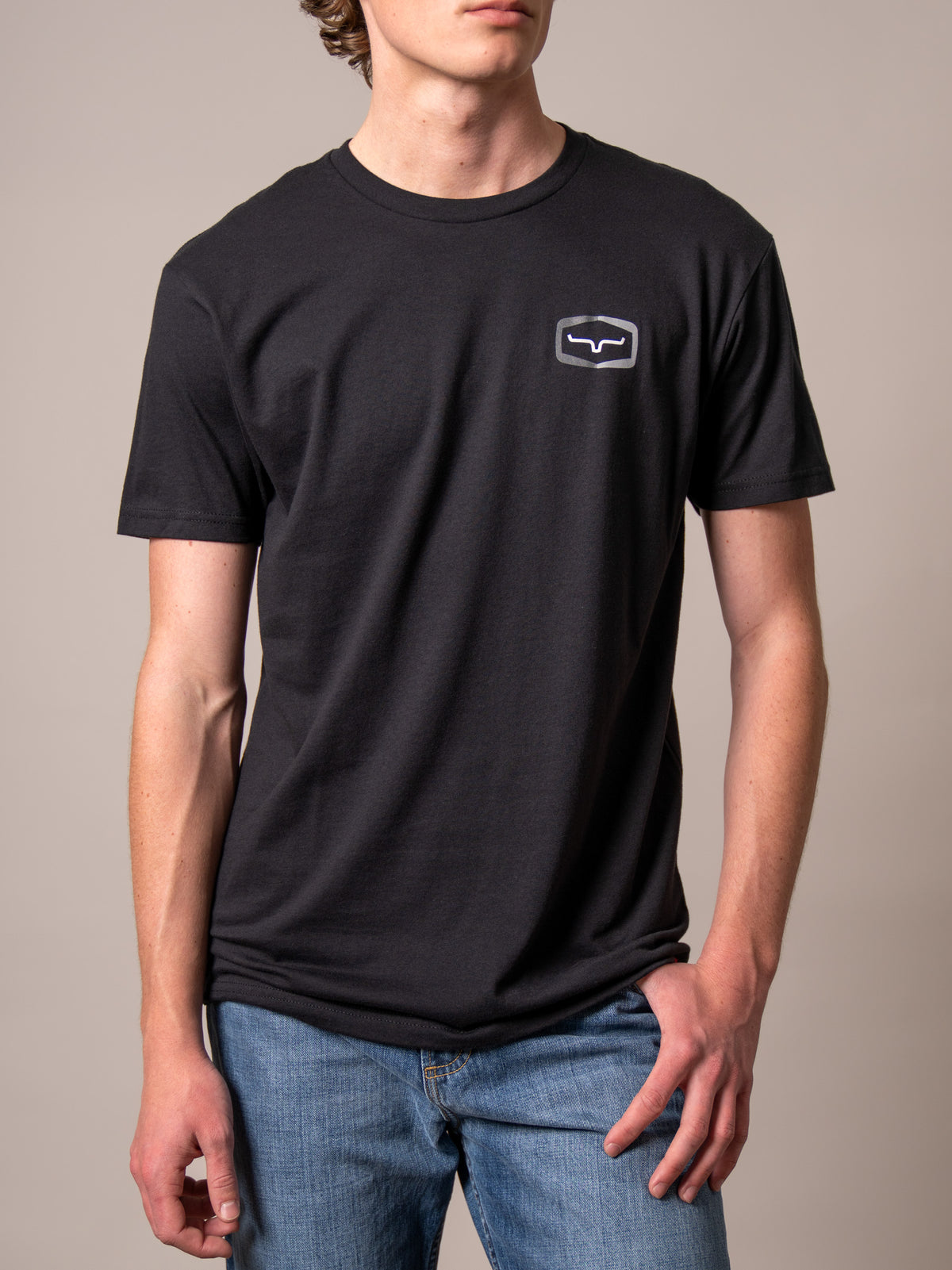 Kimes Ranch Framework shirt in Black with a short sleeve crew neck and the Kimes Ranch logo on the chest