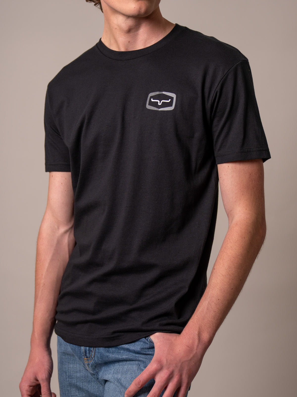 Kimes Ranch Framework shirt in Black with a crew neck and short sleeves featuring the Kimes Ranch logo on the chest