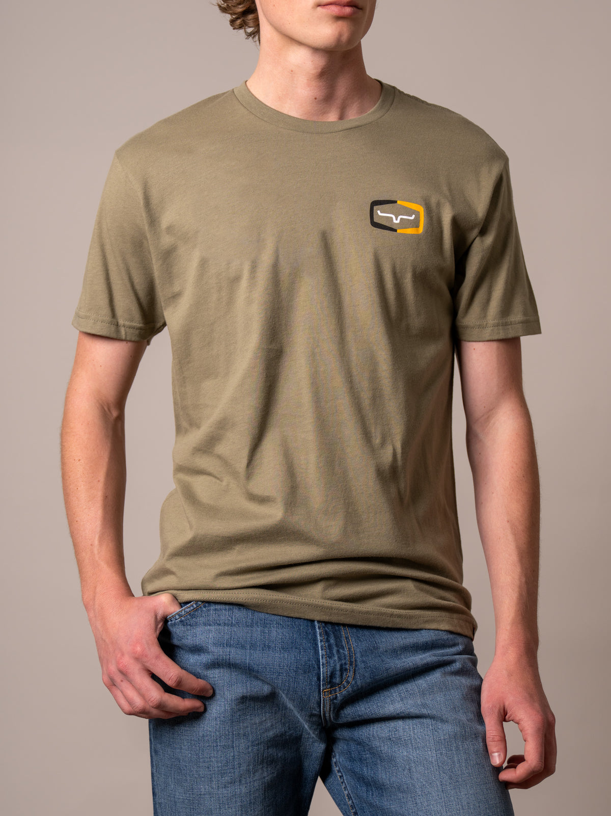 Kimes Ranch Framework shirt in Light Olive with a short sleeve crew neck and a small logo on the chest