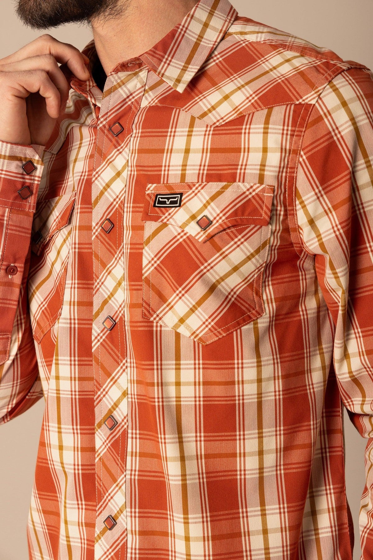 Kimes Ranch Frank dress shirt in Brick Red, close-up, with chest pockets and a logo patch